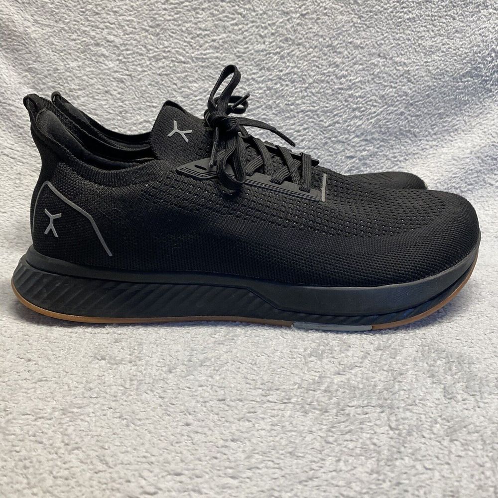 Black Athletic Shoes with Cushioned Midsole and Breathable Design
